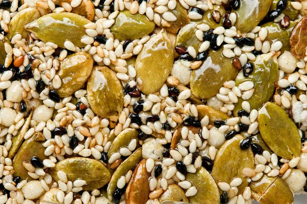 Closeup dezert křupavé osiva tykve s černou a wh — Stock fotografie