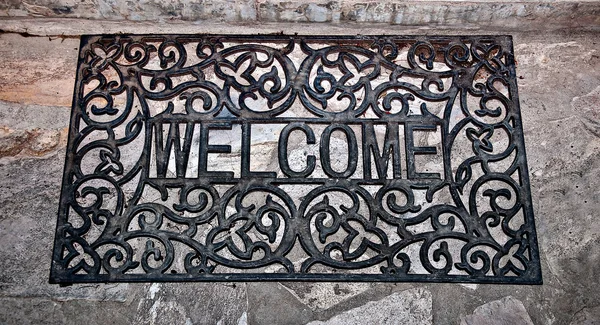 The Doormat curved steel of welcome text on floor background — Stock Photo, Image