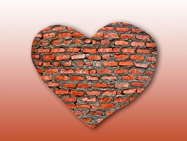Le coeur de brique sur la texture de fond — Photo