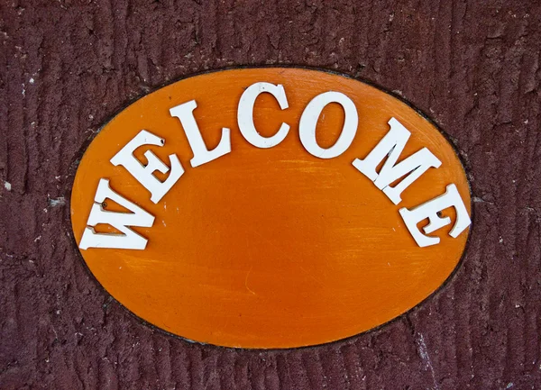 The Welcome text on wall background — Stock Photo, Image