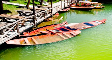 The Wooden boat sink clipart