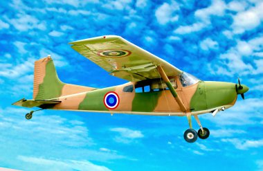 The Vintage plane of worlld war on blue sky background clipart
