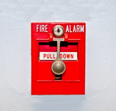 The Fire alarm embedded in the wall background clipart