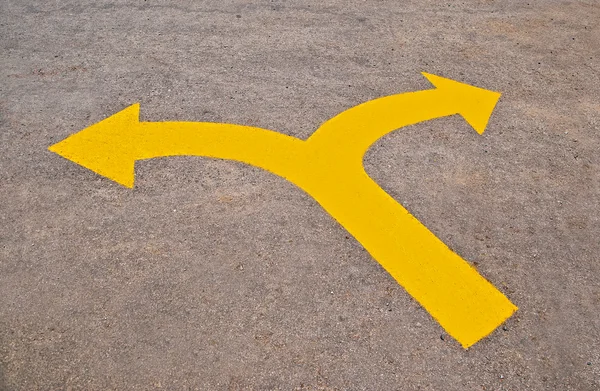 The Twin yellow arrow on the road — Stock Photo, Image
