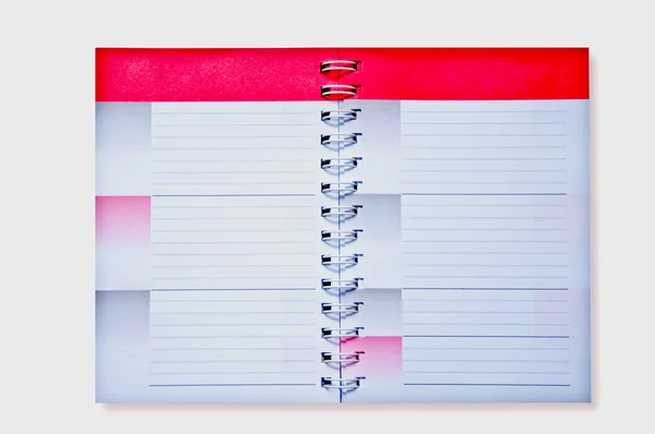 O caderno em branco isolado no fundo branco — Fotografia de Stock