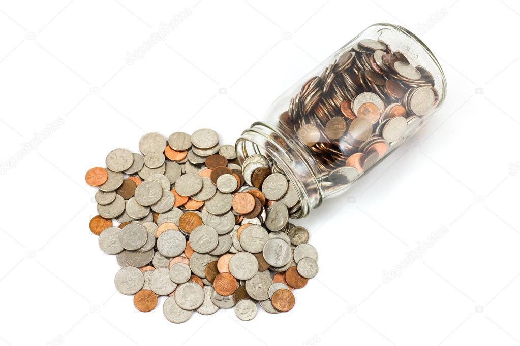 Spilled Jar of US Coins Isolated on White Background
