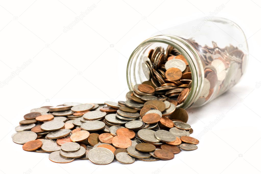 US Coins Spilled From Jar Isolated on White Background
