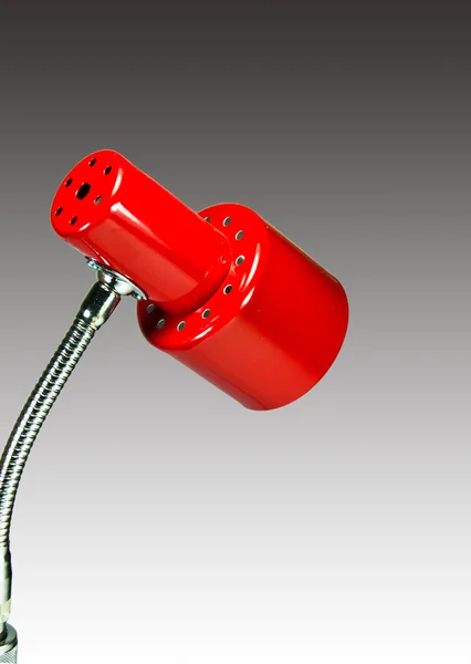 Красная настольная лампа — стоковое фото