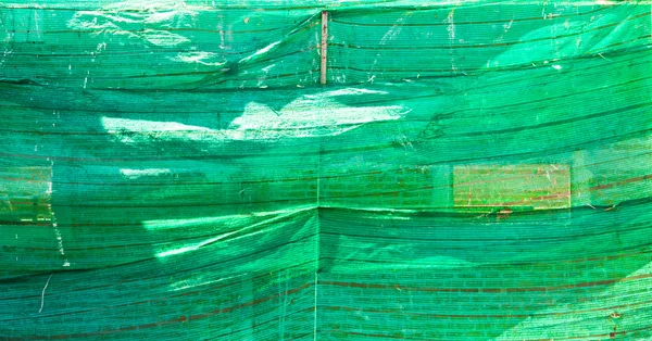Green plastic mesh in construction — Stock Photo, Image