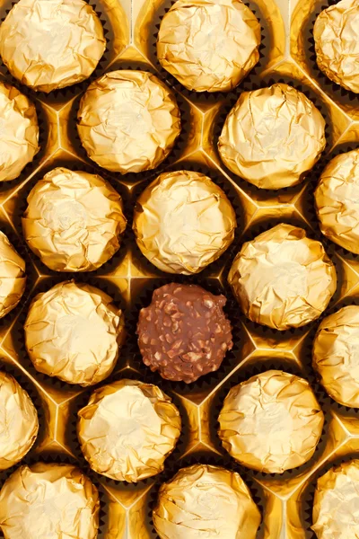 Grupo de chocolate de envoltura dorada —  Fotos de Stock
