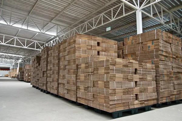 stock image Stack of folded paper box in warehouse