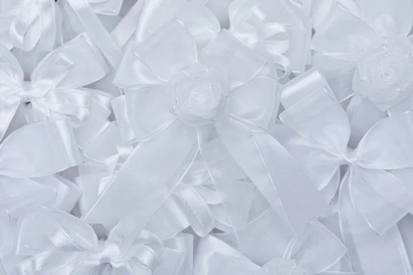 Stack of white fabric bow — Stock Photo, Image