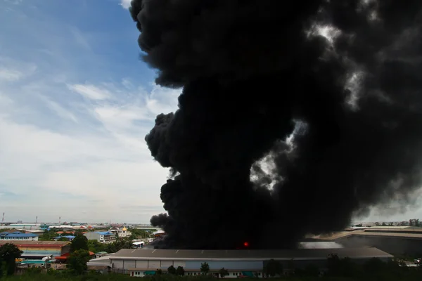Fire burning and black smoke over cargo — Stock Photo, Image