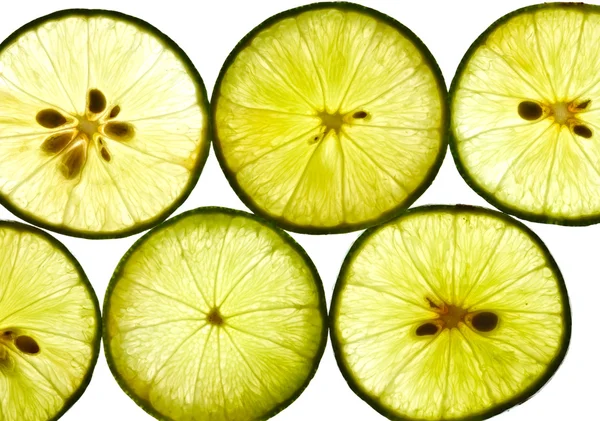 Stukken van citroen op witte achtergrond — Stockfoto