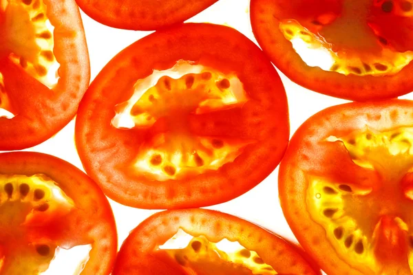 Tomatenstücke in Scheiben — Stockfoto