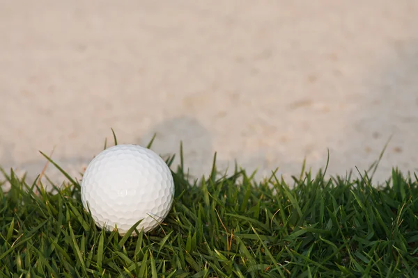 stock image Golf ball and sand bunker