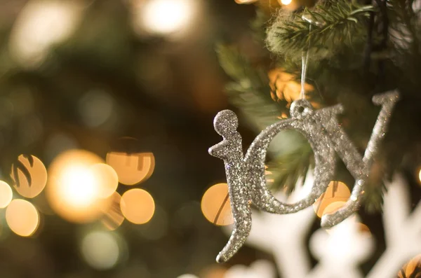 Joy ornament on christmas tree — Stock Photo, Image