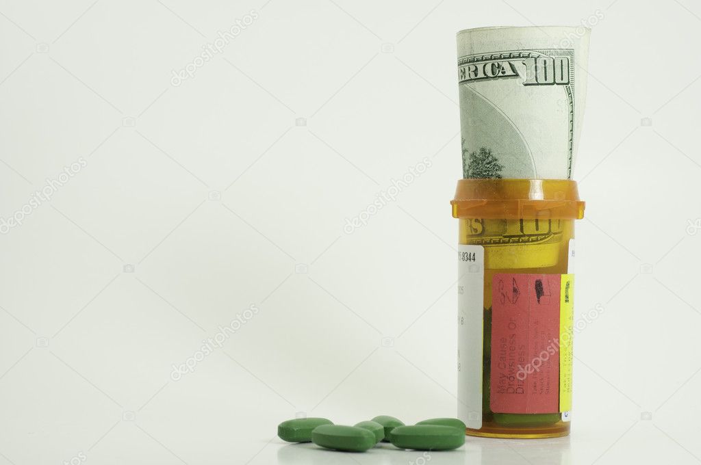 Prescription bottle with money in it