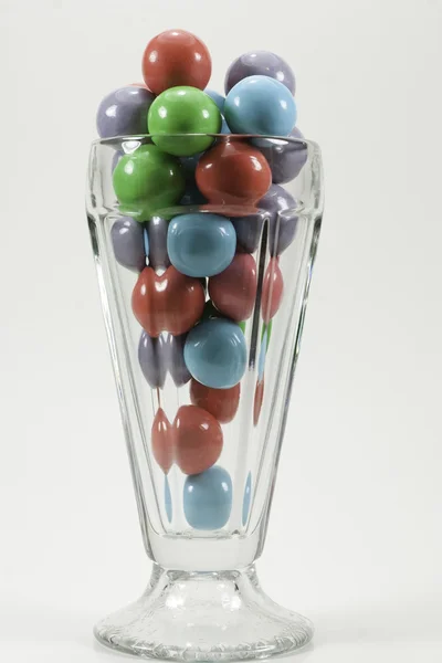 Sundae glass filled with gumballs — Stock Photo, Image