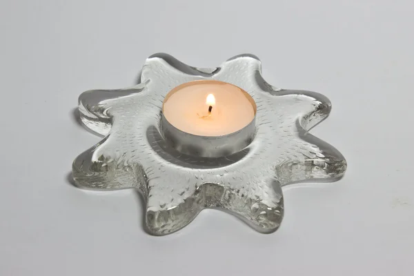 Candle on a white background — Stock Photo, Image