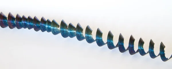 Blue iron spiral chip — Stock Photo, Image