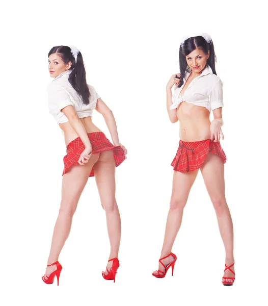 Dwa słodkie sexy uczennice gry z spódnicy, pełnej długości isolat — Zdjęcie stockowe
