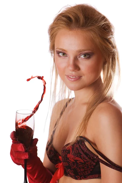 stock image Cute blond girl portrait with a splash of red wine isolated