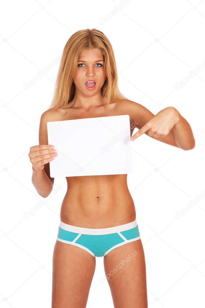 Cute young blond girl holding a paper sheet in blue panties isol