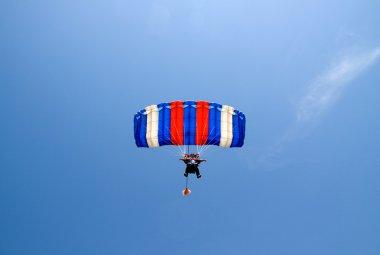 Tandem canopy flyes in the sky clipart