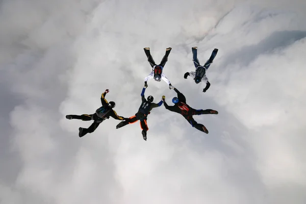 Skydivers over clouds — Stock Photo, Image