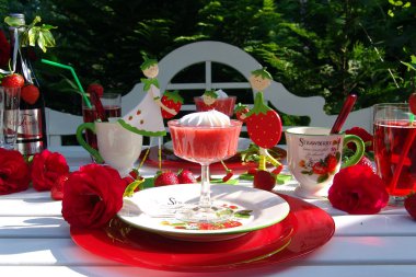 Table decoration with strawberrys. clipart
