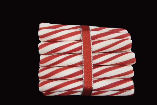 stock image Peppermint Sticks Wrapped in a Red Ribbon