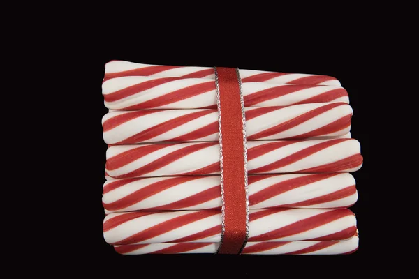Peppermint Sticks Wrapped in a Red Ribbon — Stock Photo, Image