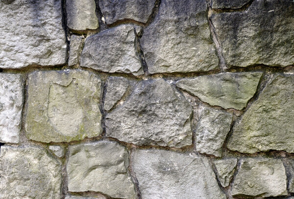 Stone wall with big grey stones