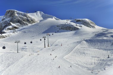 Ski runs on slopes of Hintertux Glacier clipart