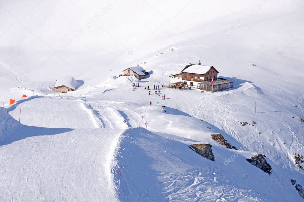 Ski run and hut in Alps