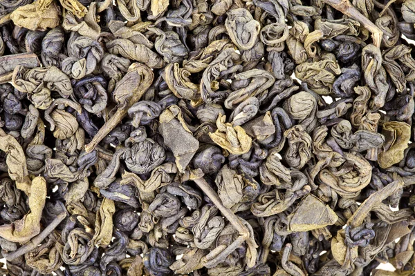 Suszonych zielonej herbaty pozostawia tekstura — Zdjęcie stockowe