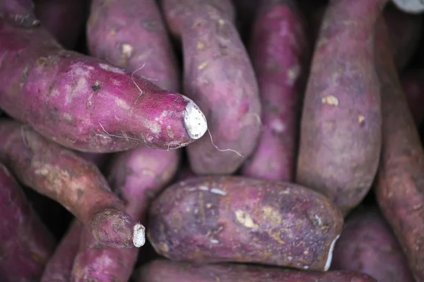 Sweet potatoes on market — Stock Photo, Image