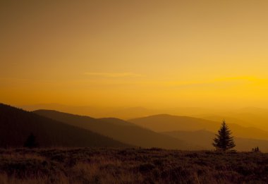 Beautiful mountain sunset panorama clipart