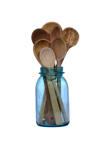 Cucchiai di legno in un barattolo blu — Foto Stock