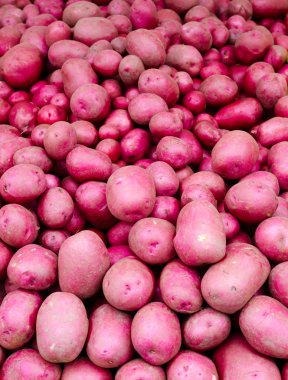 Red potatoes on display clipart