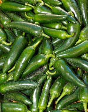 Jalapeno peppers on display clipart