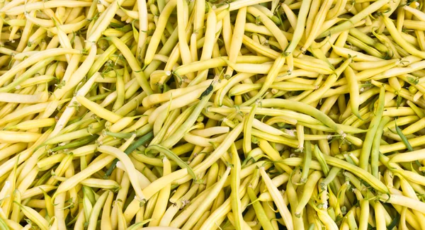 Yellow snap beans on display — Stock Photo, Image