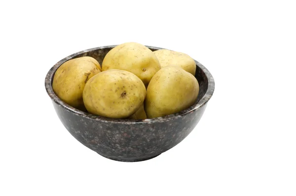 White potatoes in bowl isolated on white — Stockfoto