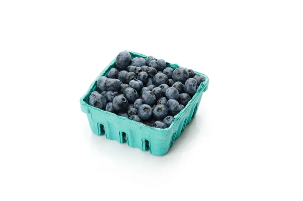 Pint container of blueberries on white — Stock Photo, Image