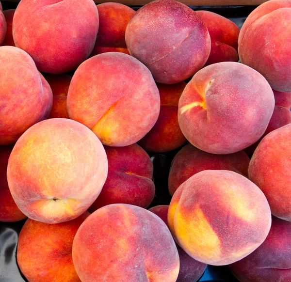 Peaches on display — Stock Photo, Image