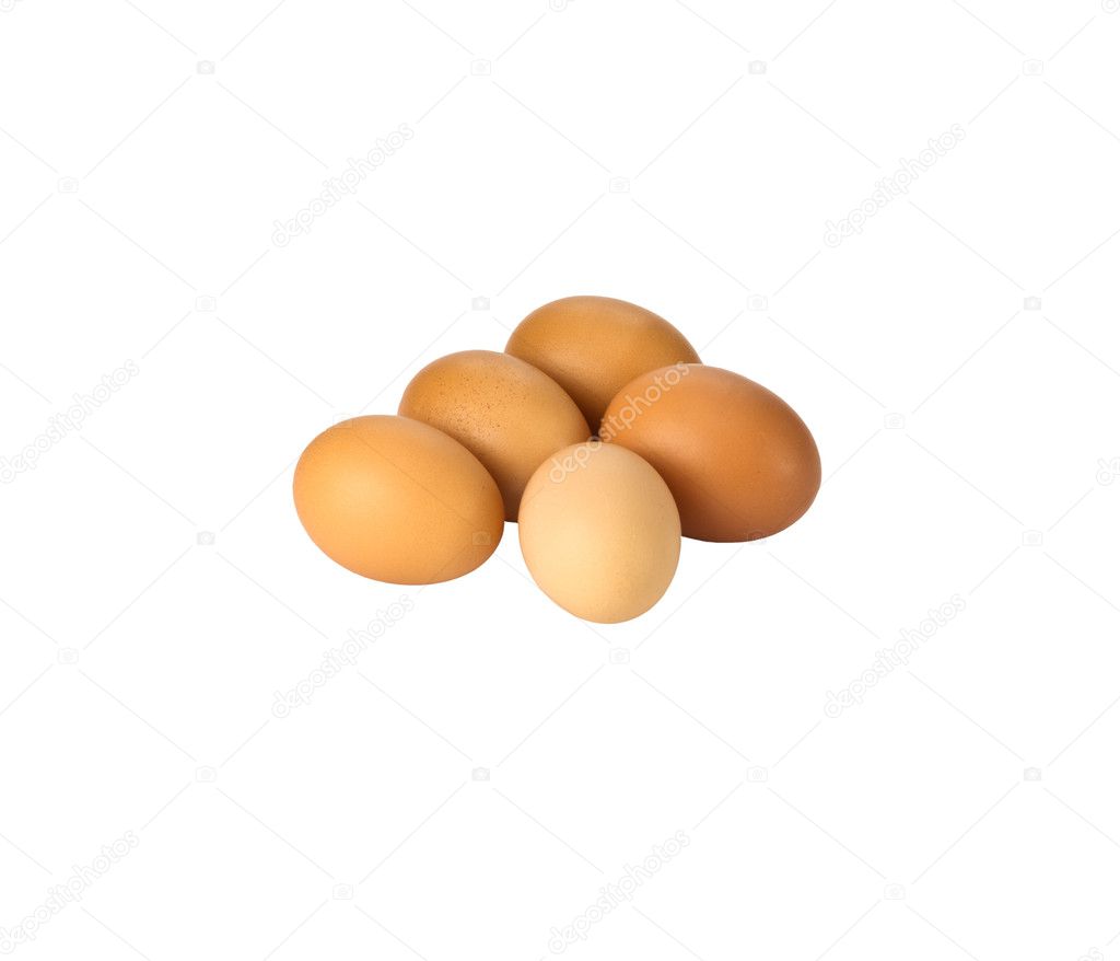 Five brown eggs on white