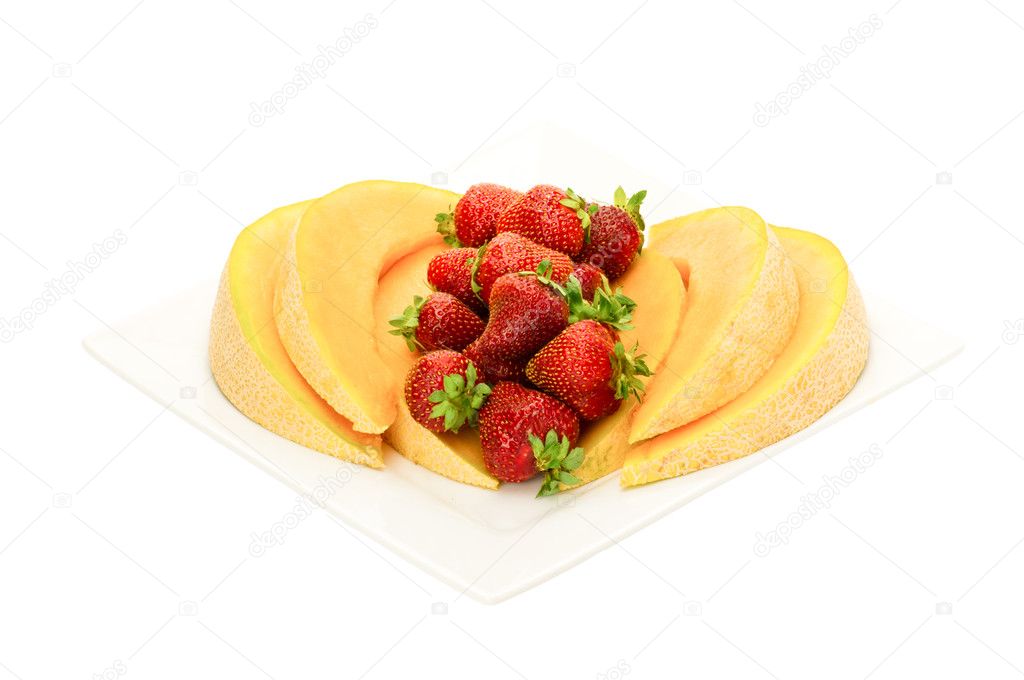 Fruit desert with cantaloupe and strawberries
