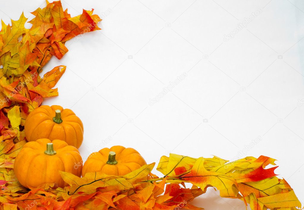 Colorful fall leaves and pumpkins