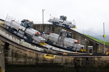 Three electric locomotives on the Panama Canal clipart